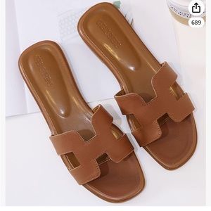 Flat slide sandals with H band